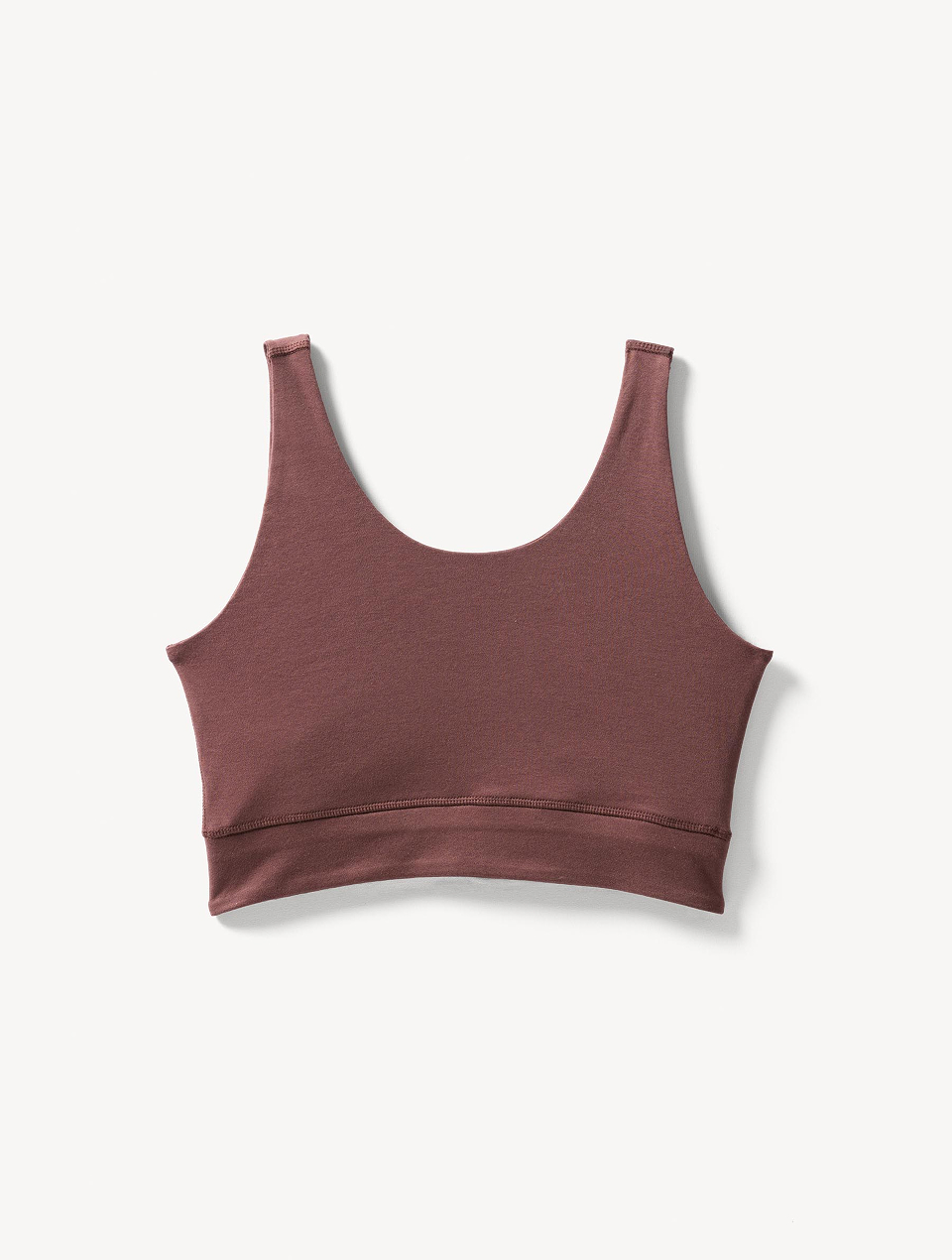 roter Yoga Bra vor weißem Hintergrund