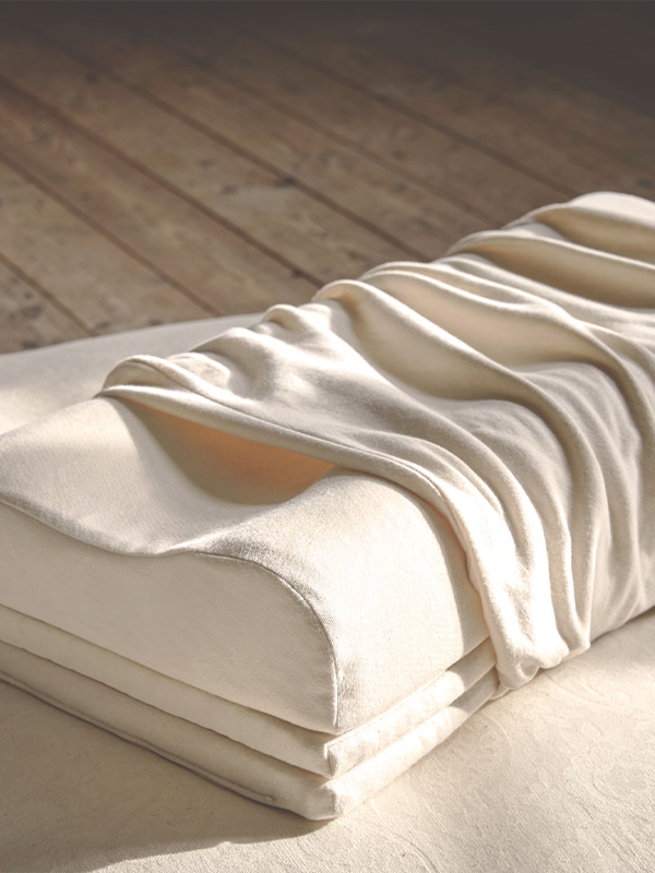 Nackenstützkissen aus Naturlatex mit Überzug