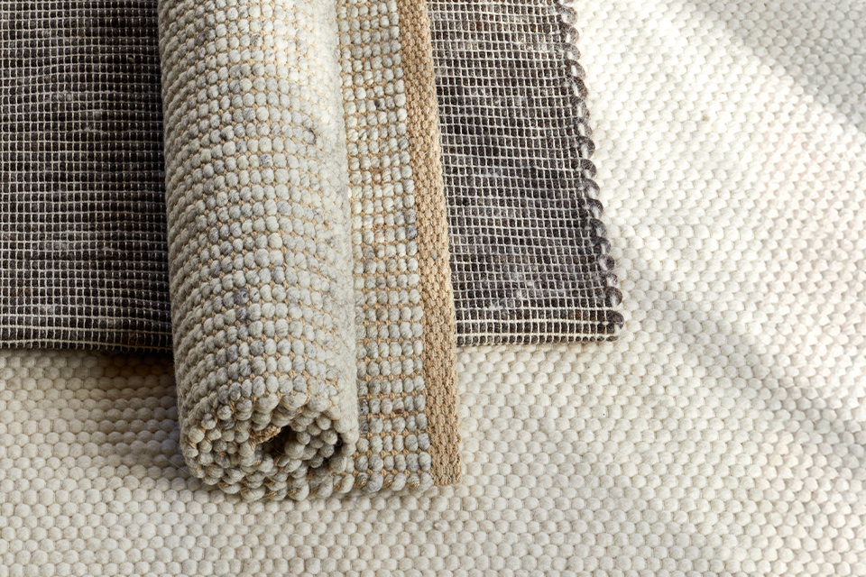 Drei Teppiche aufeinanderliegend