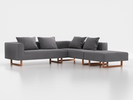 Ecksofa Sereno, 276 x 276 cm, inkl. 4 Kissen (70 x 55 cm), Liegeteil rechts, Kufenfuß, mit Bezug Wollstoff Kaland Kiesel (68), Buche