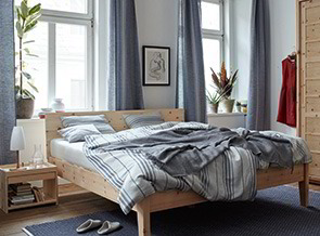 Ein Schlafzimmer mit Materialien aus der Natur schafft ein natürliches Raumklima.