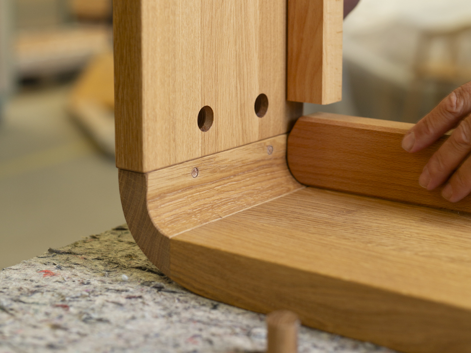 Detailbild Fertigung Massivholz Bettfuß